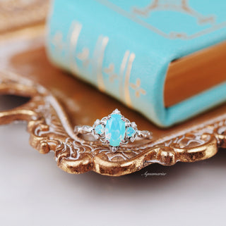 Esme Opalescent Blue Sapphire Mermaid Ring in 925 Sterling Silver