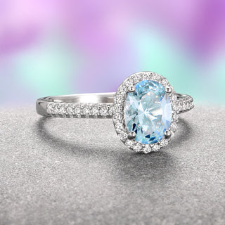 Iris Halo Oval Aquamarine Ring in Sterling Silver