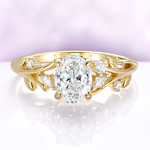 Oval lab-grown diamond leaf and vine engagement ring in solid 14K yellow gold