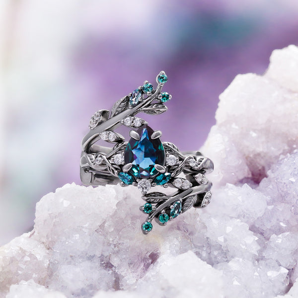 Wisteria alexandrite fairy leaf ring in black ruthenium on a geode