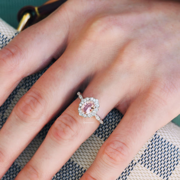 Cordelia Vintage Morganite Engagement Ring in Sterling Silver featuring an oval morganite center stone with a sparkling halo on a sterling silver band by Aquamarise.