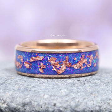 Starry Night Van Gogh Fire Opal & Rose Gold Leaf Couples Ring Set featuring a vivid blue fire opal inlay with scattered rose gold leaf fragments on a polished band, crafted by Aquamarise from Matching Couples' Rings and October Birthstone collections.