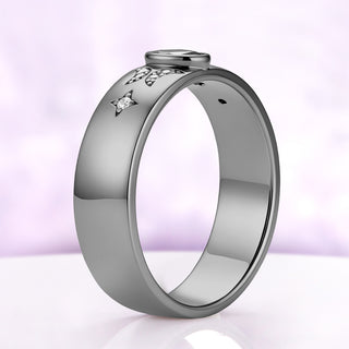 Side profile of the alexandrite celestial band in black ruthenium, showing the 6 mm dome and the low bezel