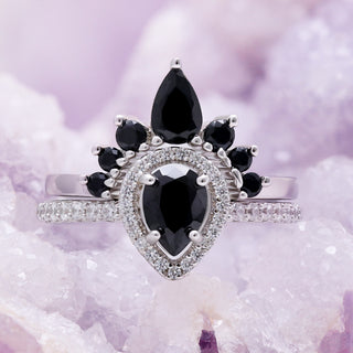 Pear cut black onyx engagement ring set in sterling silver with pave band