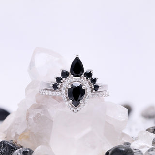 Close-up of the teardrop black onyx center stone in a sterling silver setting