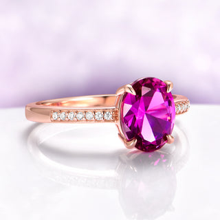 Ava Pink Tourmaline Engagement Ring in 14K Rose Gold Vermeil by Aquamarise, featuring a radiant oval pink tourmaline with diamond accents on a polished rose gold vermeil band.