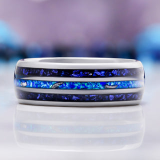Close-up of the meteorite texture and blue fire opal inlay channel