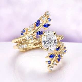 Lab-Grown Diamond & Sapphire Leaf Engagement Ring Set in 14K Solid Yellow Gold (IGI Certified) by Aquamarise Gold, featuring intricate sapphire and diamond accents in a nature-inspired design.