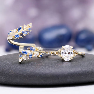 Lab-Grown Diamond & Sapphire Leaf Engagement Ring Set in 14K Solid Yellow Gold (IGI Certified) by Aquamarise Gold, featuring detailed blue sapphire and diamond leaf accents on a yellow gold band.