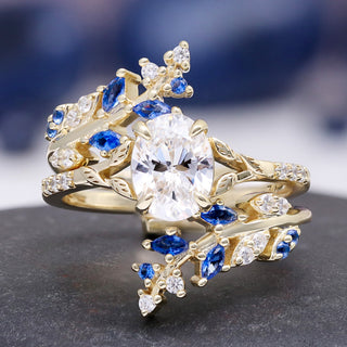 Lab-Grown Diamond & Sapphire Leaf Engagement Ring Set in 14K Solid Yellow Gold (IGI Certified), featuring intricate leaf motifs with blue sapphire and diamond accents by Aquamarise Gold.
