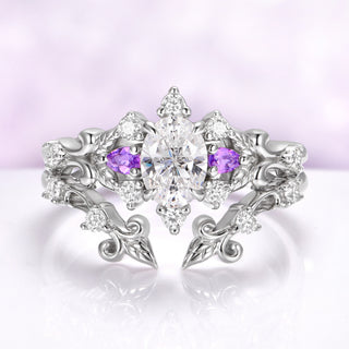 Carmilla amethyst engagement ring nested inside the matching leaf and vine enhancer band in sterling silver