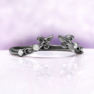 Angled view of the black ruthenium Carmilla enhancer band showing the open front, carved leaves and three moissanite on each shoulder