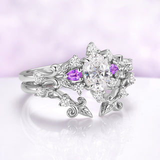 Angled view of the Carmilla sterling silver enhancer worn together with an engagement ring on one finger