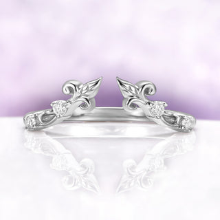 The enhancer band from the Carmilla ruby set, an open leaf and vine wrap in sterling silver
