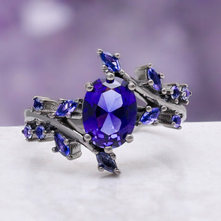 Cornflower Blue Sapphire Leaf Engagement Ring in Black Ruthenium – angled view