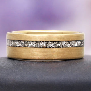 Crushed Diamond Gold Tungsten Ring (8mm) by Aquamarise, featuring a brushed yellow-gold band with an off-center channel of raw silver-white crushed diamond crystals.