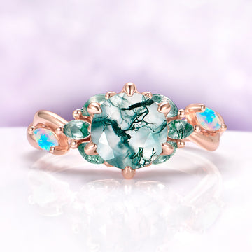 Enchanted Garden Green Moss Agate & Fire Opal Ring in 14K Solid Rose Gold featuring a detailed moss agate center stone with fire opal side accents in an elegant rose gold setting.