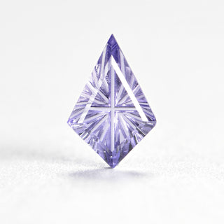 Faelight Cut lab-grown lavender purple sapphire kite 6 x 9 mm loose gemstone, concave starburst facets, on white
