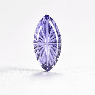 Faelight Cut lab-grown lavender purple sapphire marquise 5 x 10 mm loose gemstone, concave starburst facets, on white