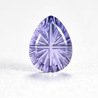 Faelight Cut lab-grown lavender purple sapphire pear 6 x 8 mm loose gemstone, concave starburst facets, on white