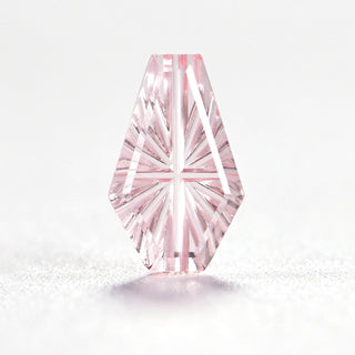 Faelight Cut lab-grown pink sapphire coffin 6 x 10 mm loose gemstone, concave starburst facets, on white