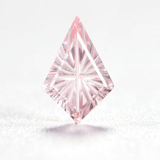 Faelight Cut lab-grown pink sapphire kite 6 x 9 mm loose gemstone, concave starburst facets, on white