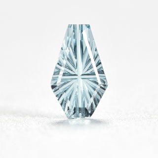Faelight Cut natural sky blue topaz coffin 6 x 10 mm loose gemstone, concave starburst facets, on white
