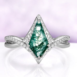 Faelyn Kite Moss Agate Fairy Engagement Ring in Sterling Silver by Aquamarise, green moss agate kite in a carved silver halo on a crossover band