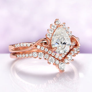 Faye Vintage Pear Shaped Moissanite Engagement Ring Set in Solid 14K Rose Gold
