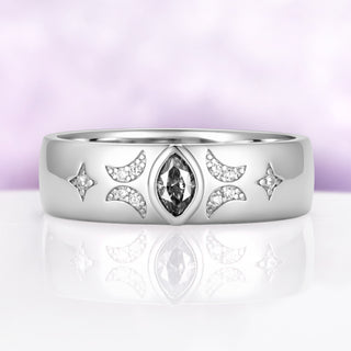 Close view of the gray moissanite celestial band showing the milgrain-edged crescents, star accents and polished dome profile