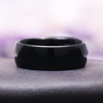 Minimalist Black Tungsten Couples Ring Set by Aquamarise featuring a smooth, polished black tungsten carbide band, presented as part of Matching Couples' Rings, Black Finish Rings, and Meaningful Jewelry Gifts collections.