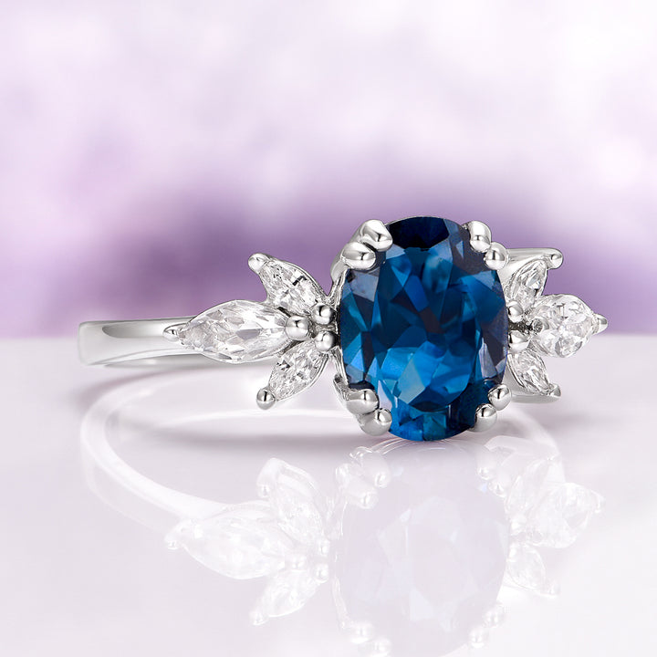 Eva London Blue Topaz Engagement Ring in Sterling Silver