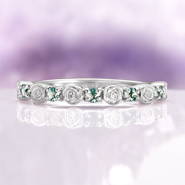 Green Moss Agate Flower Wedding Band in 14K White Gold by Aquamarise Gold, featuring sculpted rose motifs and natural moss agate stones for a delicate, nature-inspired wedding ring.