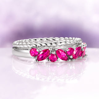 Willow Marquise Cut Ruby Stacking Ring Set in Sterling Silver by Aquamarise featuring bold marquise and round ruby stones with a twisted silver band in a romantic, elegant design.