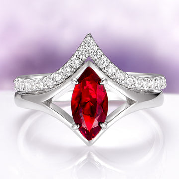 Natural Red Garnet Marquise Cut Engagement Ring Set in 14K White Gold featuring a vivid marquise-cut red garnet centerpiece with a delicate white gold band adorned with sparkling diamonds, crafted by Aquamarise Gold.