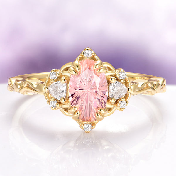 Esme Fireworks Cut Morganite Engagement Ring in 14K Solid Yellow Gold by Aquamarise Gold, featuring a dazzling star-cut oval morganite center stone accented with pear-shaped diamonds and intricate vintage-inspired gold detailing, part of Solid Gold Engagement Rings and Morganite Jewelry collections.