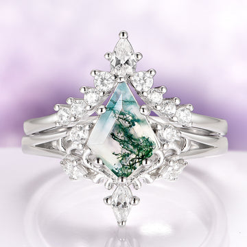 Elowen Kite Cut Green Moss Agate Engagement Ring Set in Sterling Silver by Aquamarise, featuring a kite-cut moss agate center stone surrounded by sparkling clear stones in a nature-inspired design.