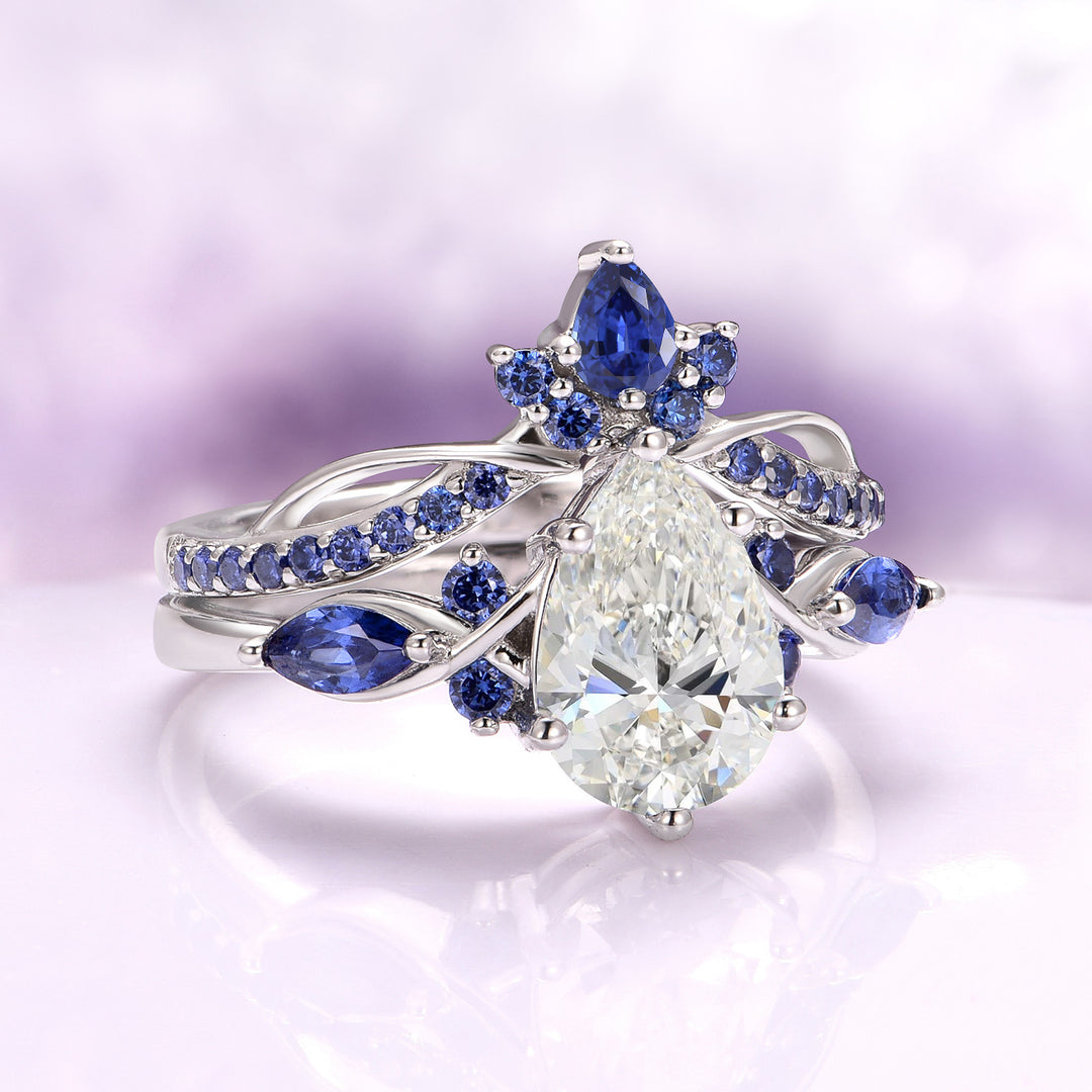 Feyra Moissanite and Blue Sapphire Engagement Ring Set in 14K White Gold