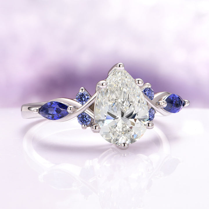 Feyra Moissanite and Blue Sapphire Engagement Ring Set in 14K White Gold