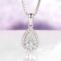 Vera Teardrop White Sapphire Necklace in Sterling Silver by Aquamarise featuring a lab-grown white sapphire with a sparkling halo on a sterling silver chain, part of September Birthstone Jewelry collections.