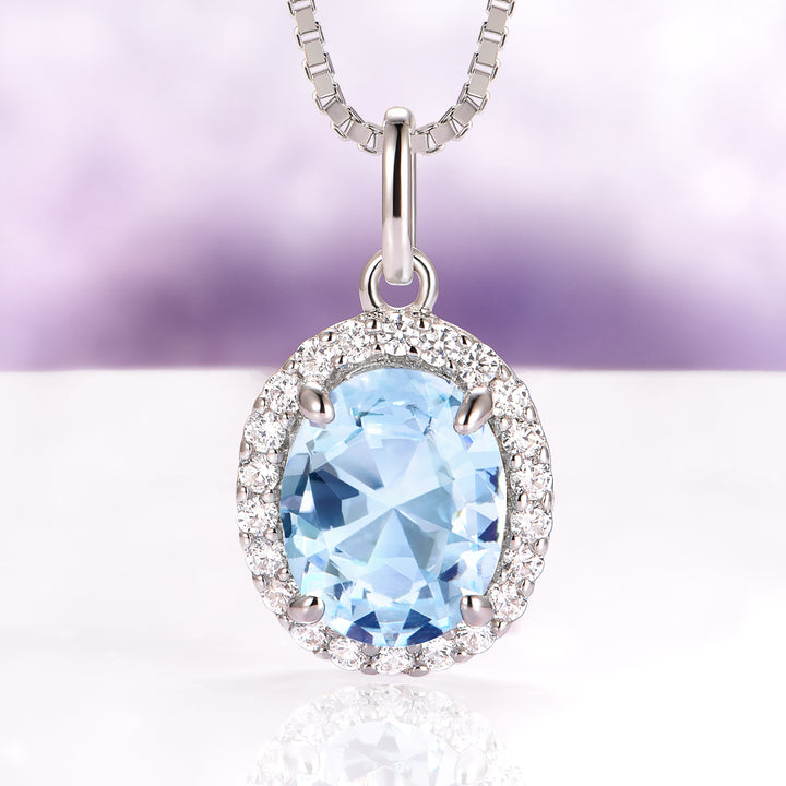 Iris Halo Oval Aquamarine Necklace in Sterling Silver