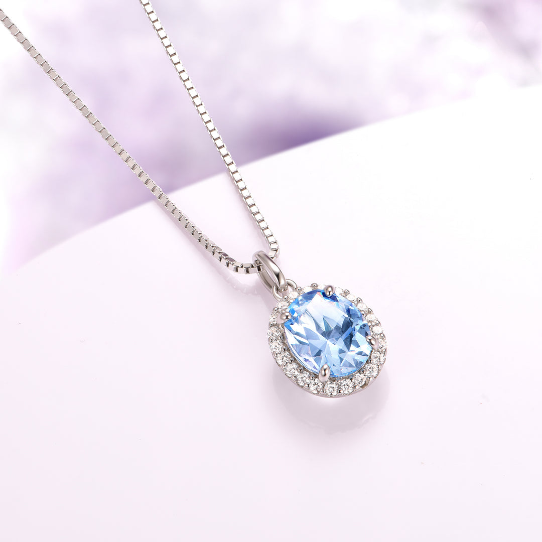Iris Halo Oval Aquamarine Necklace in Sterling Silver