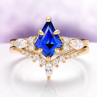 Skye Kite® Blue Sapphire Ring Set in 14K Solid Yellow Gold featuring a striking kite-cut blue sapphire centerpiece with diamond accents by Aquamarise Gold, from the Skye Kite® Jewelry Collection.