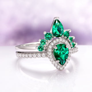 Amy Vintage Emerald Ring Set in Sterling Silver by Aquamarise featuring pear-shaped emeralds and sparkling diamond accents in a vintage-inspired design with an Art Deco twist.