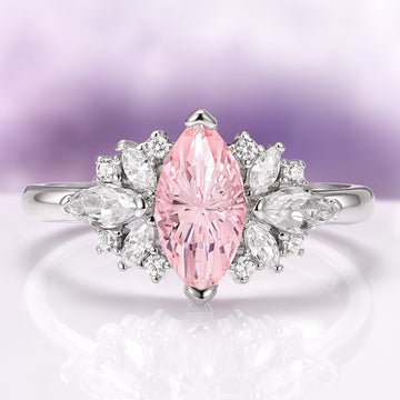 Adeline Unique Fireworks Cut Morganite Couples Ring Set by Aquamarise featuring a marquise-cut pink morganite center stone surrounded by crushed diamond cubic zirconia accents on a polished sterling silver and tungsten band, part of Matching Couples' Rings and Fantasy-Inspired Jewelry collections.