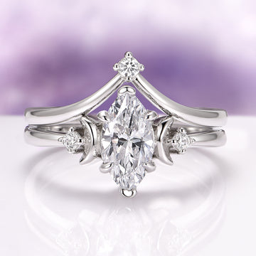 Moissanite & Crescent Moon Constellation Couples Ring Set featuring a marquise-cut moissanite center flanked by crescent and star accents in polished sterling silver by Aquamarise, part of Matching Couples' Rings and Best Selling Jewelry collections.