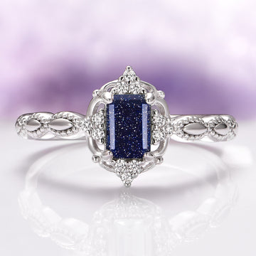 Starry Night (Sandstone) Engagement Ring in 14K White Gold featuring an emerald-cut Galaxy Sandstone with sparkling diamond accents and an intricate band by Aquamarise Gold.