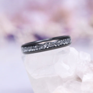 Starlux Crushed Diamond Couples Ring Set featuring a sleek black tungsten carbide band inlaid with shimmering silver stones, crafted by Aquamarise for Matching Couples' Rings and April Birthstone Jewelry collections.