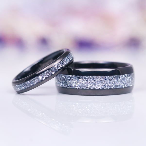 Starlux Crushed Diamond Couples Ring Set by Aquamarise featuring polished black tungsten carbide bands with a dazzling inlay of crushed silver stones, perfect for Matching Couples' Rings and April Birthstone Jewelry collections.