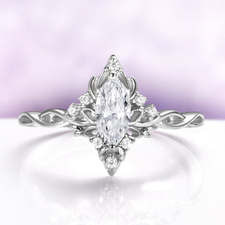 Marquise butterfly and lotus engagement ring in 14K white gold by Aquamarise Gold with sparkling accent stones